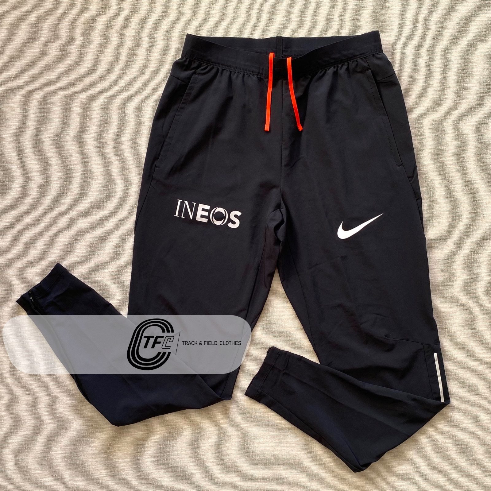 De Dios Competidores restaurante INEOS x Nike 2022 NN Running Team Pro Elite Lightweight Track Pants |  Trackandfieldclothes